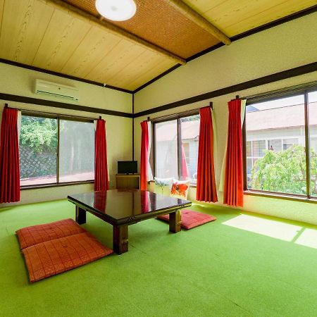 癒楽 伊豆大島 Hostel Bagian luar foto