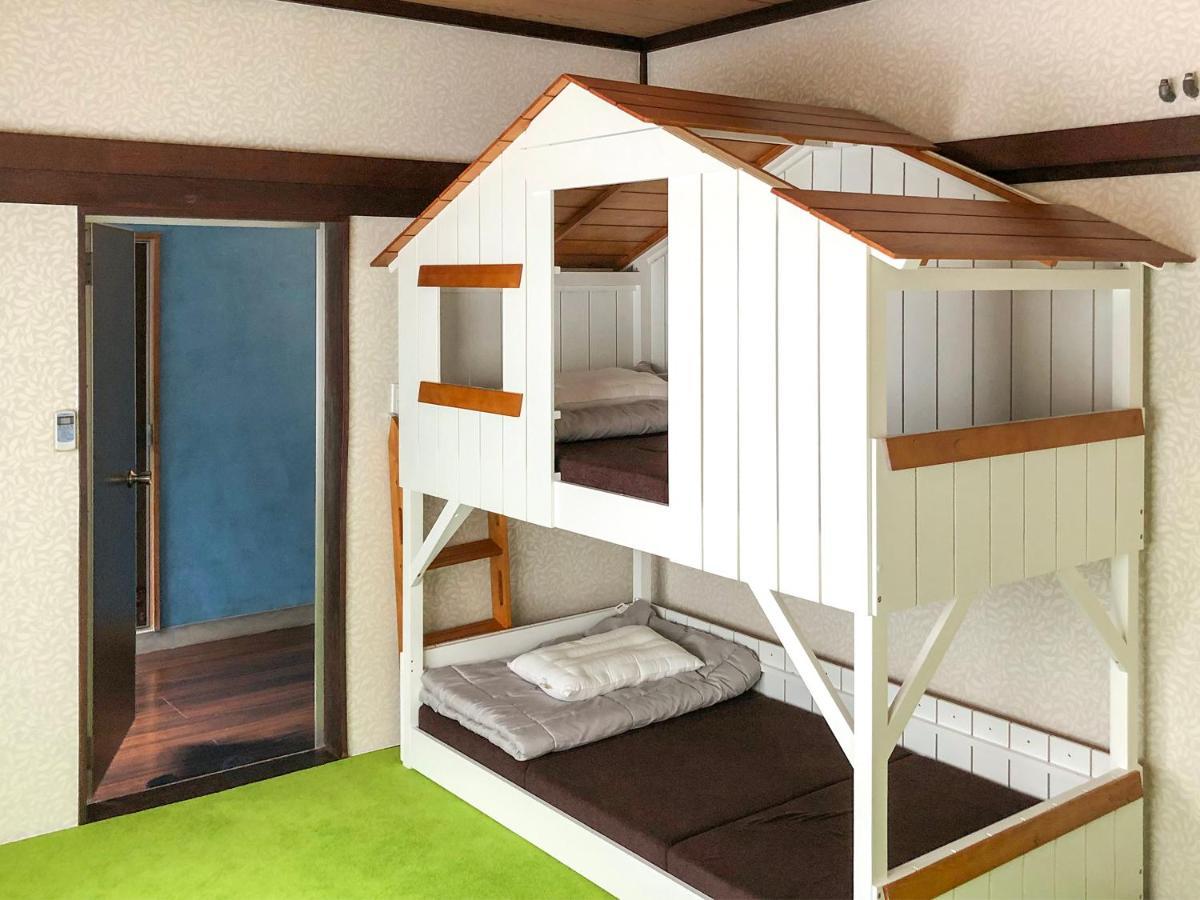 癒楽 伊豆大島 Hostel Bagian luar foto