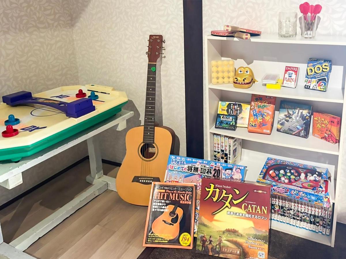 癒楽 伊豆大島 Hostel Bagian luar foto